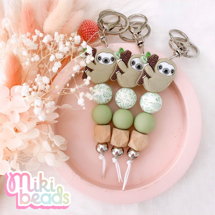 Botanical Sloth Queen Keychain